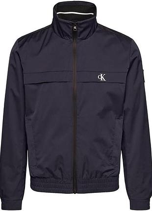 Чоловіча вітровка темно синього кольору calvin klein xs