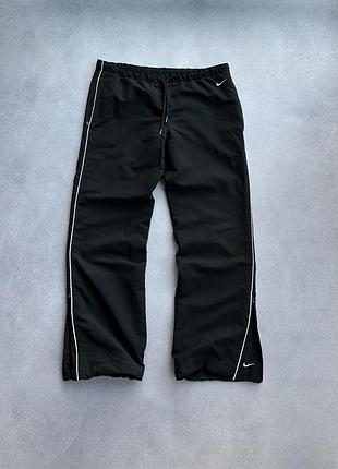 Вінтажні жіночі спортивки nike vintage flared pants.