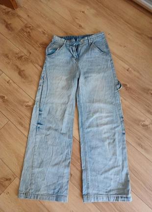 Джинсы широкие женские