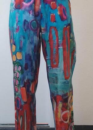 Нові штани з кольоровою абстракцією р. м,  поліестер, з кишенями