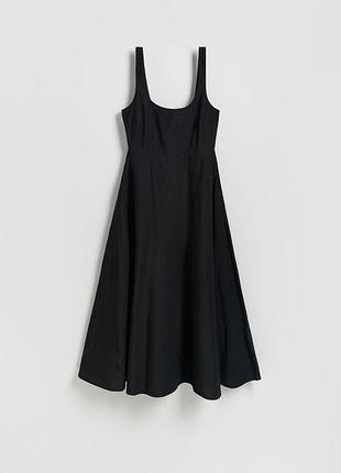 Чорна сукня з кишенями