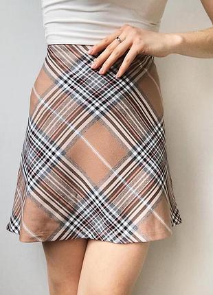 Нова спідниця трапеція в клітинку коричнева бежева жіноча міні коротка на резинці шкільна офісна базова primark
