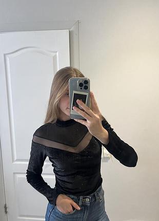 Нове велюрове боді з блискітками та напівпрозорими вставками бренду intimissimi