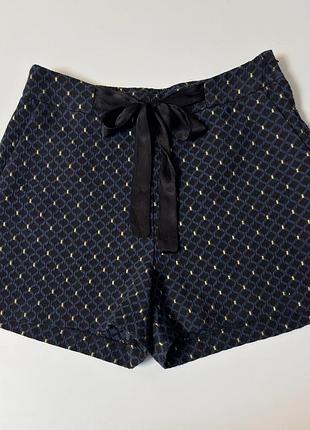 Синьо-чорні шорти із золотими вкрапленнями та бантом orsay