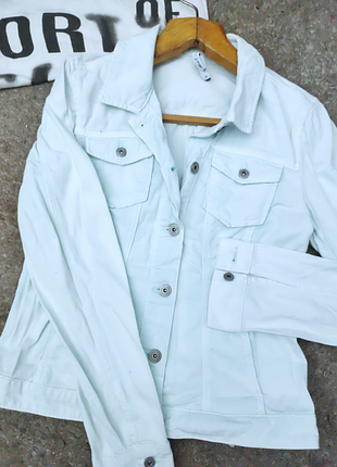 Полегшений джинсовий піджак