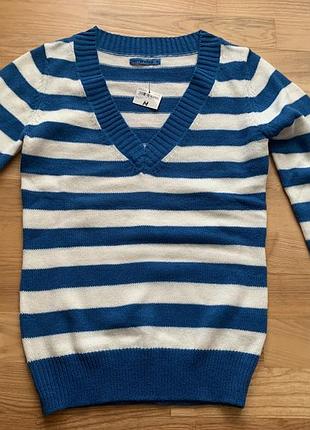 Смугастий светр полосатий