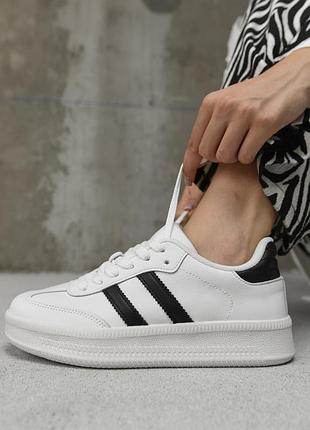 Женские кожаные кроссовки белые с черными полосками кампуси