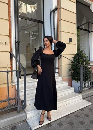 Неймовірна сукня міді з розрізом на нозі та рукавами ліхтариками