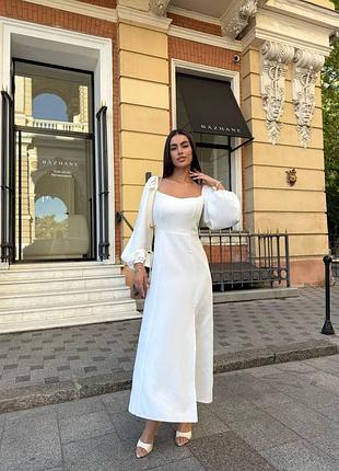 Неймовірна сукня міді з розрізом на нозі та рукавами ліхтариками