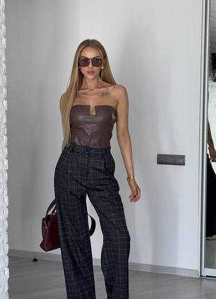 Женские брюки в клетку