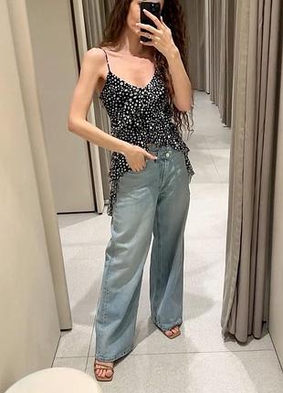 Легкий воздушный топ в черно белый горошек с рюшами zara 
🌷🌷🌷🌷🌷🌷🌷🌷