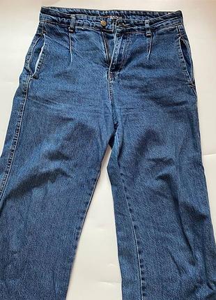 Джинсы клеш