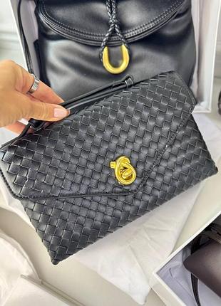 Сумка женская кожаная чёрная плетеная конверт