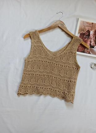 Золотистий топ з люрексом