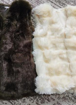 Новые меховые жилетки.