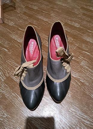 Впечатляющие кожаные уникальные туфли