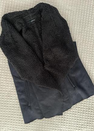 Жилетка тепла