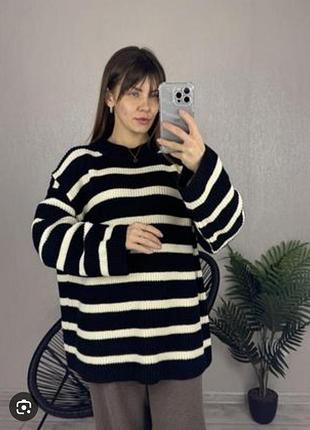 Теплий светр в смужку