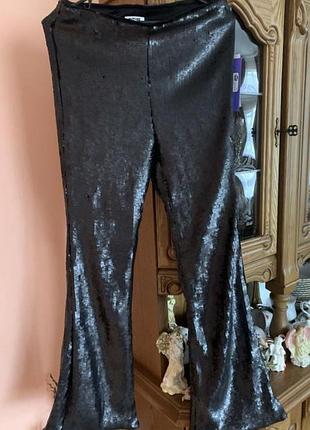 Стильные женские брюки в пайетки черные новые