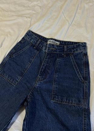 Джинси синього кольору