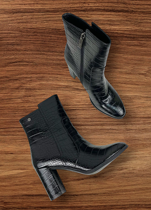 Високі ботильони з широкою халявою