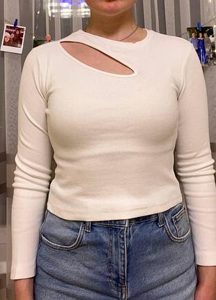 Біла кофта з розрізом