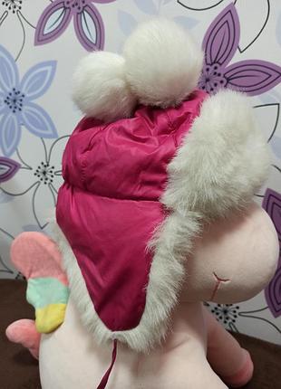 Тепла зимова шапка з хутром і зав'язками