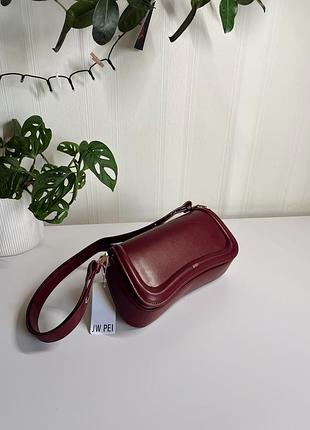 Жіноча сумка багет jw pei бордового кольору