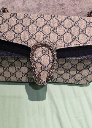 Жіноча сумка-клатч gucci