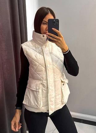 Жіноча жилетка