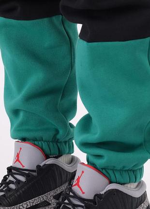 Штани чоловік. nike jordan jumpman air fleece trousers (арт. ck6694-011)7 фото