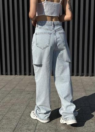 Джинси з розрізом по бокам