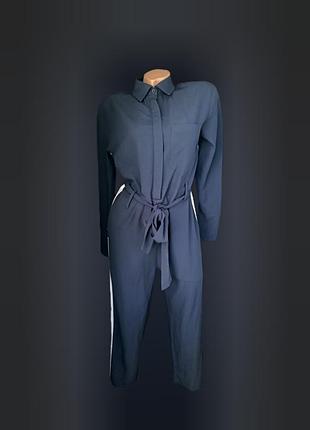 Спортивный брючный комбинезон с белыми полосками по бокам женский