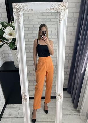 Яскраві брюки