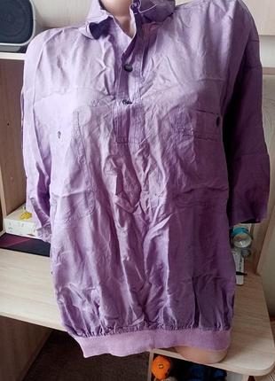 Блузка внизу на резинці колір бузковий розмір 48-50 схоже на шовк