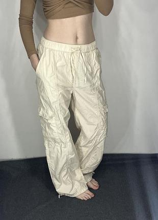 Штани бежеві  карго з карманами