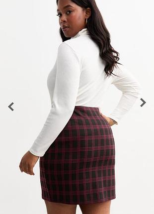 Спідниця в клітинку