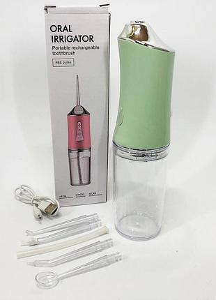 Іригатор для чищення зубів та порожнини рота oral irrigator з акумулятором та змінними насадками. колір: зелений