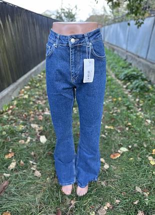 Джинси кльоши