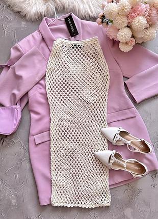 Зваблива пляжна спідниця кремового відтінку