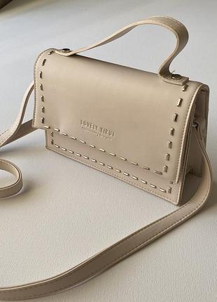 Маленька пудрова жіноча сумочка