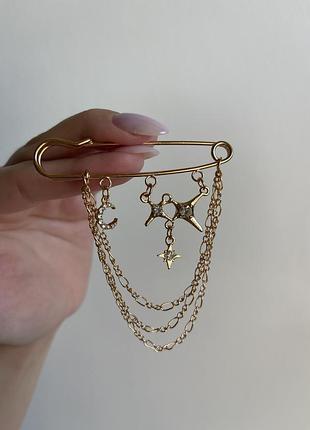 Металева брошка зоряне сяйво