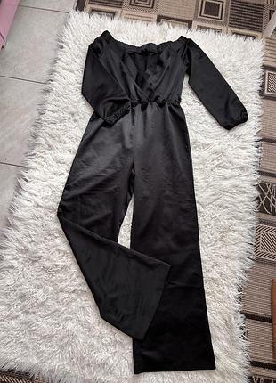 Чорний оталчсний комбінезон м