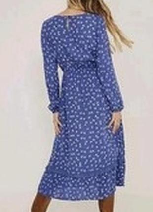 Сукня міді