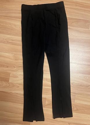 Чорні брюки лосини кльош з розрізом zara next