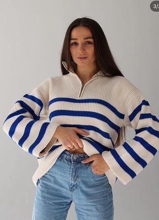 Подовжена молочна кофтинка у синю смужку