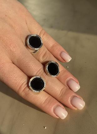 Срібна каблучка із золотими пластинами, камінь - онікс.