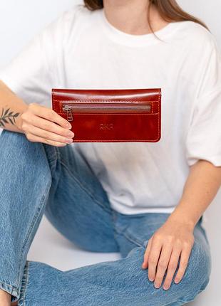 Гаманець з натуральної шкіри кентукі рудого кольору.