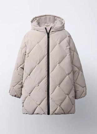 Легке стьобане прогумоване пальто