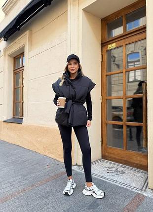 Теплая женская жилетка с поясом из плащёвки на 250 силиконе 42-48 черная